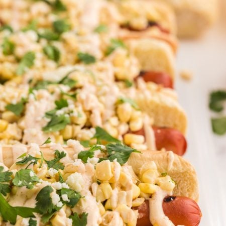 Mexican Street Corn Hot Dogs on a plate