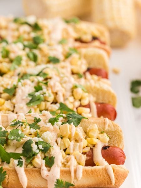 Mexican Street Corn Hot Dogs on a plate