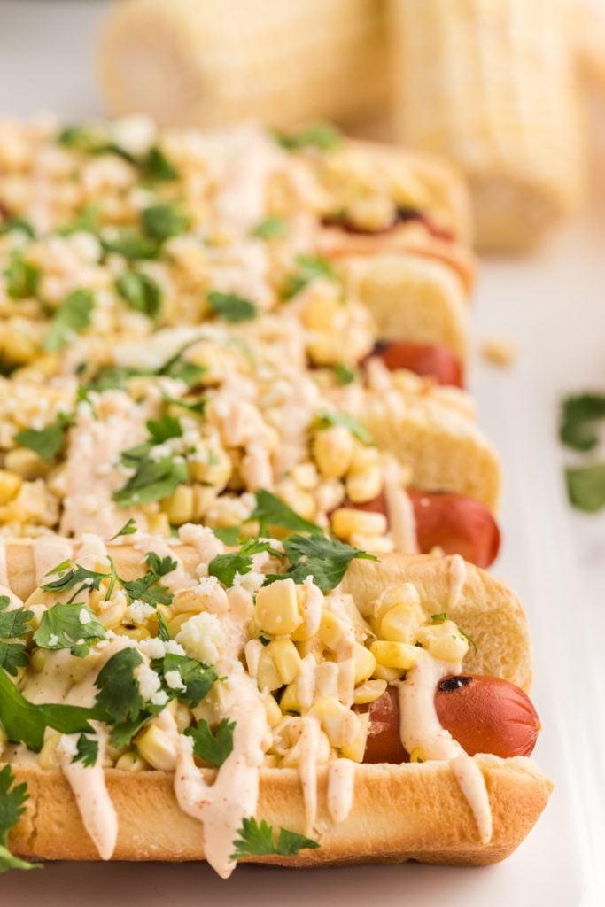 Mexican Street Corn Hot Dogs on a plate