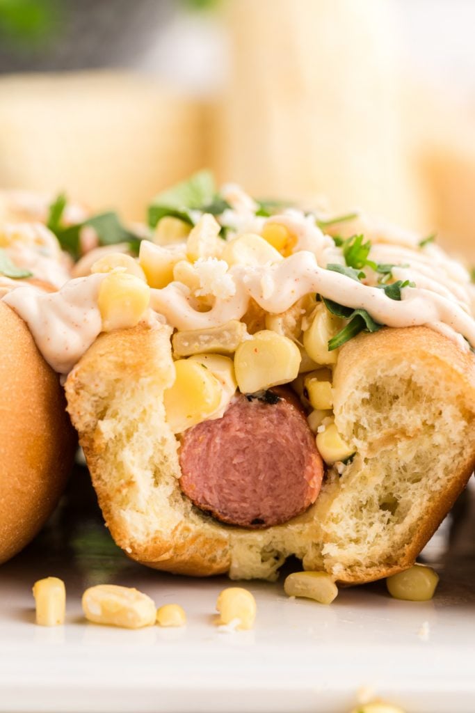 Side photo of Mexican Street Corn Hot Dog