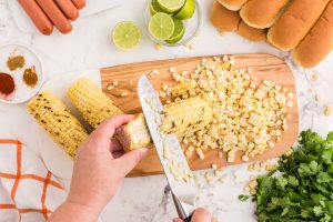 removing corn from the cob