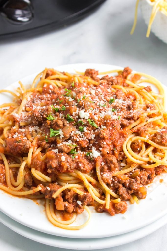 Slow Cooker Bolognese Sauce with pasta on a plate
