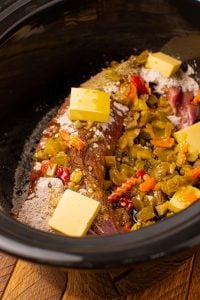 rained giardiniera and sliced butter pieces added to slow cooker