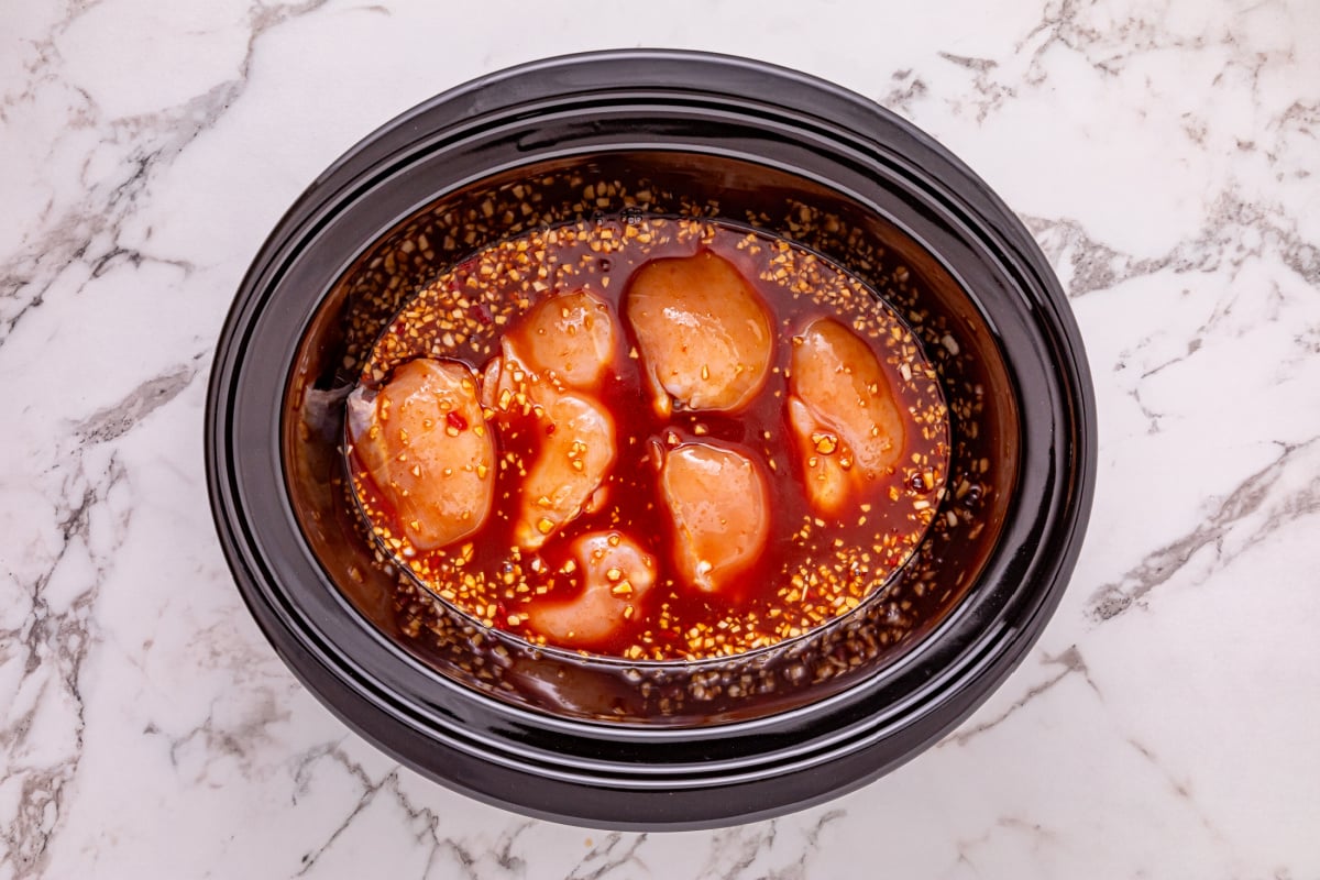 sauce added to crockpot with chicken