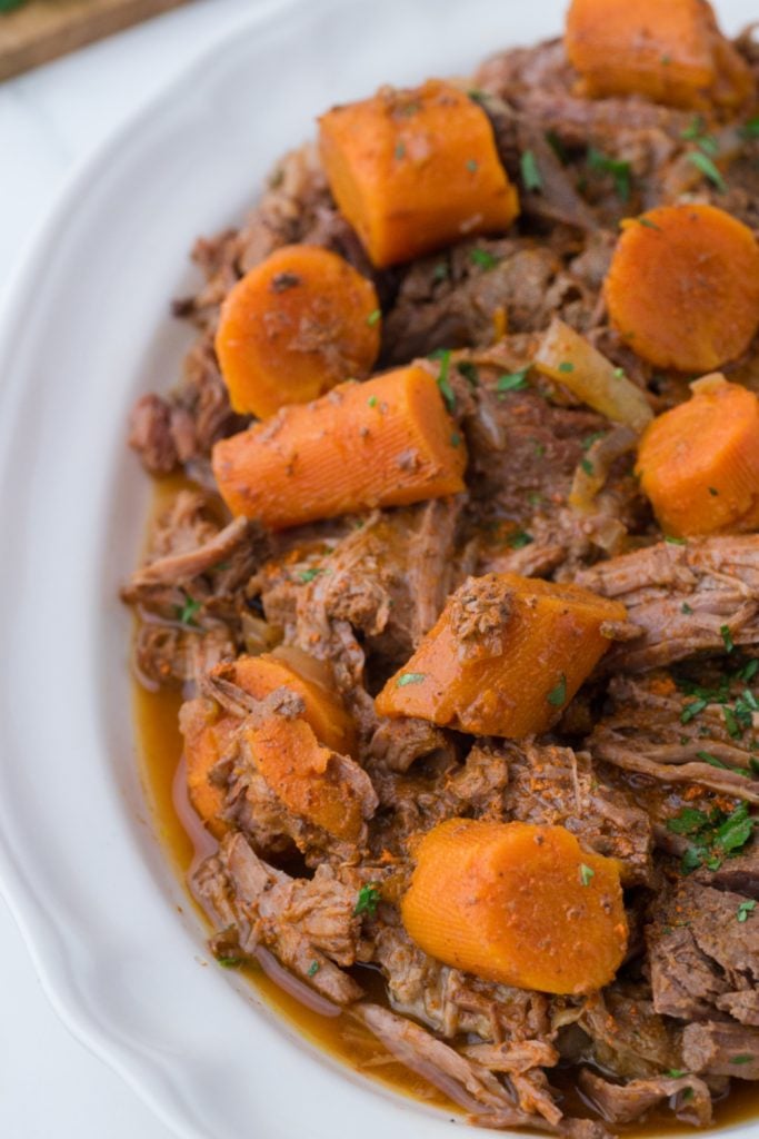 Slow Cooker Pot Roast and Carrots on a serving platter