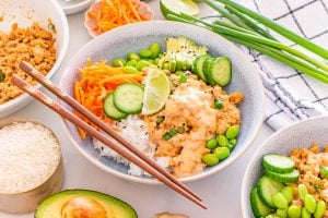 bang bang ground chicken bowl on a table