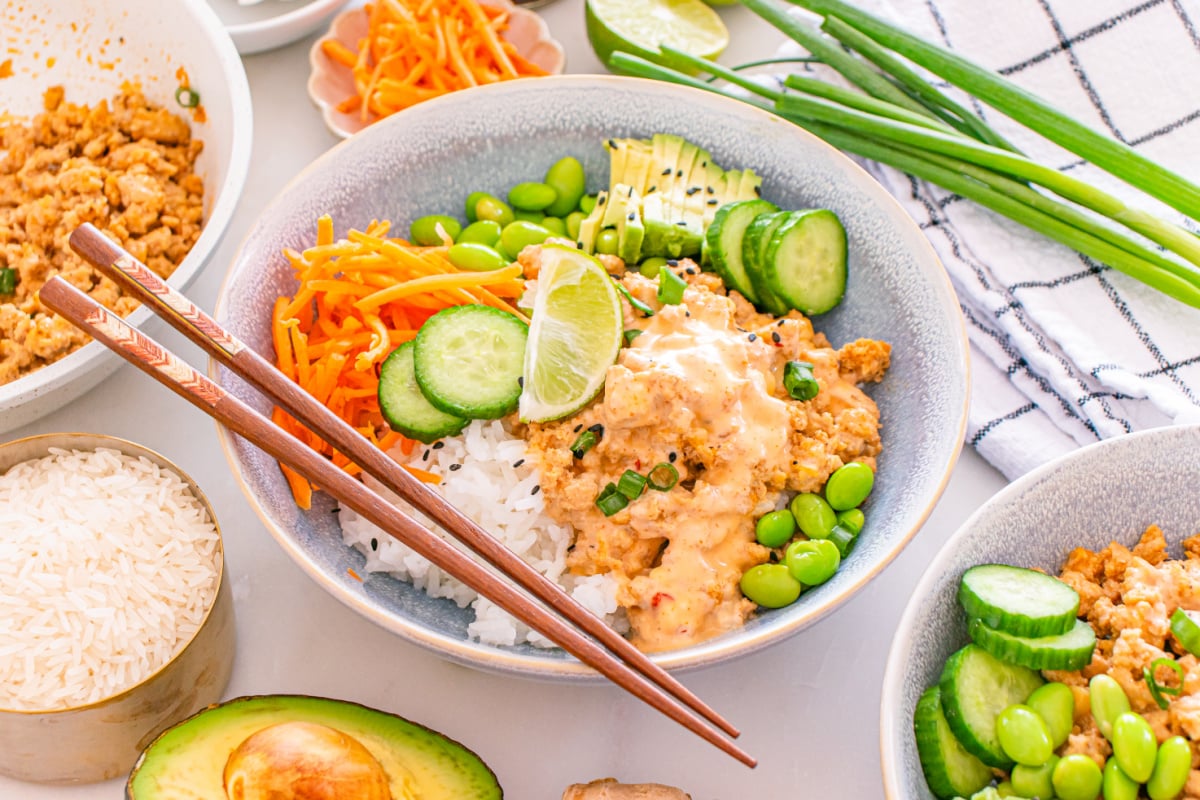 bang bang ground chicken bowl on a table