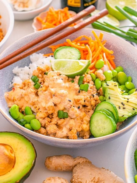 bang bang ground chicken bowl on a table