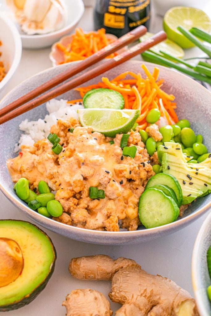 bang bang ground chicken bowl on a table