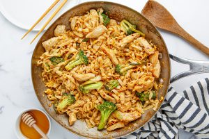thai chicken pad see ew in a pan