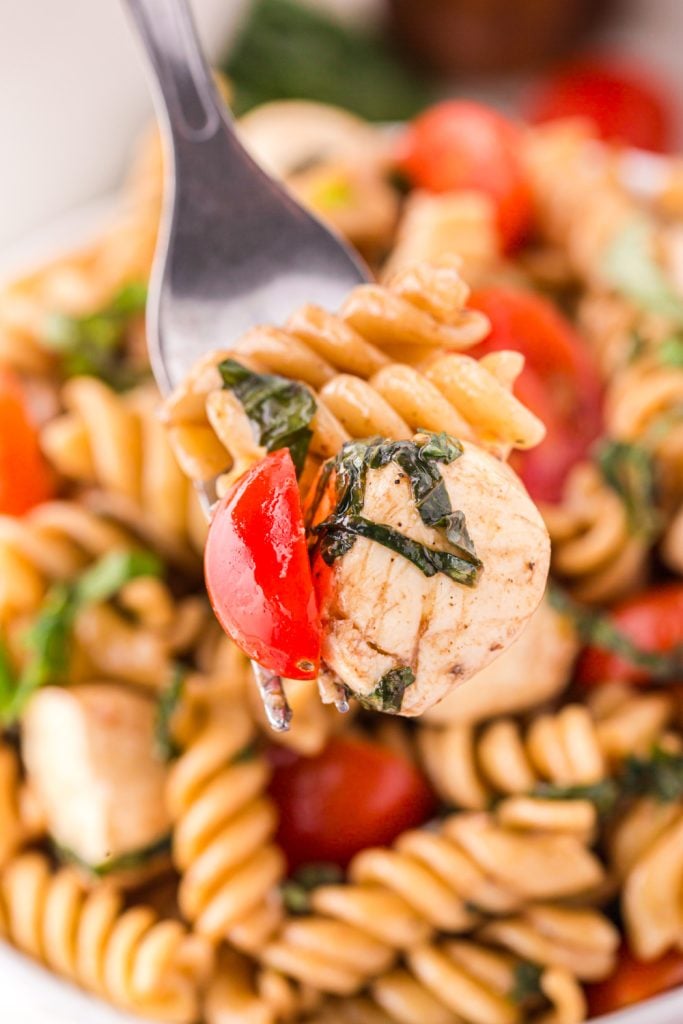 Caprese Pasta Salad on a fork