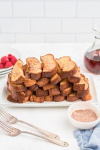 Homemade Air Fryer French Toast Sticks on a plate