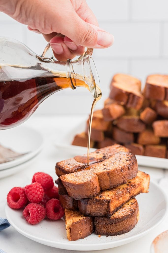 Homemade Air Fryer French Toast Sticks on a plate