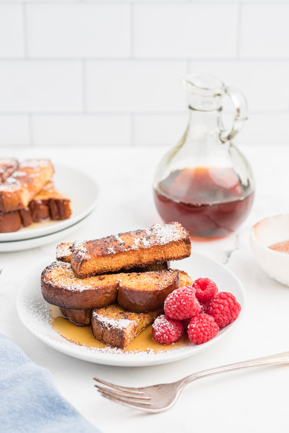 Homemade Air Fryer French Toast Sticks on a plate