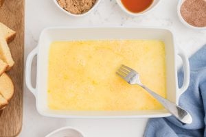 melted butter and milk in a dish