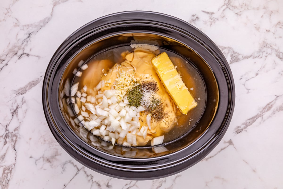 butter added to slow cooker