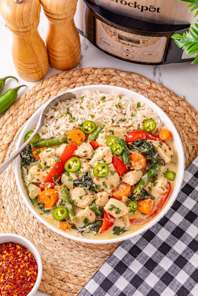 Slow Cooker Thai Green Curry Chicken in a bowl with rice