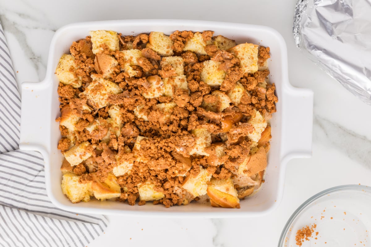 cold butter with the cookie crumbs placed on top of cassserole