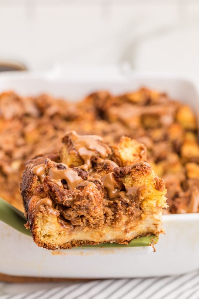 piece of Biscoff Stuffed French Toast Casserole on a spatula