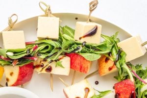 Cheddar Apple Salad Skewers on a plate