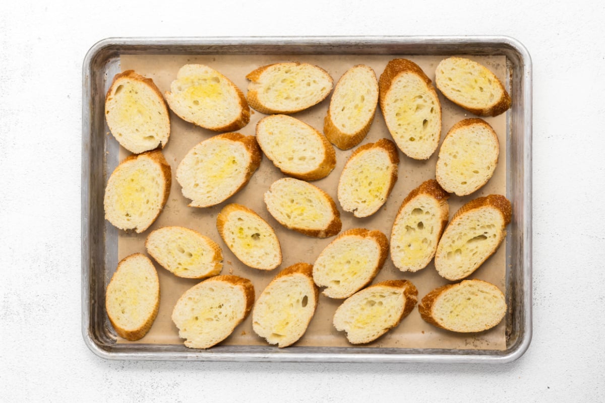 baguette slices on baking sheet