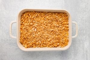 Ritz crackers with melted butter added to top of chicken mixture