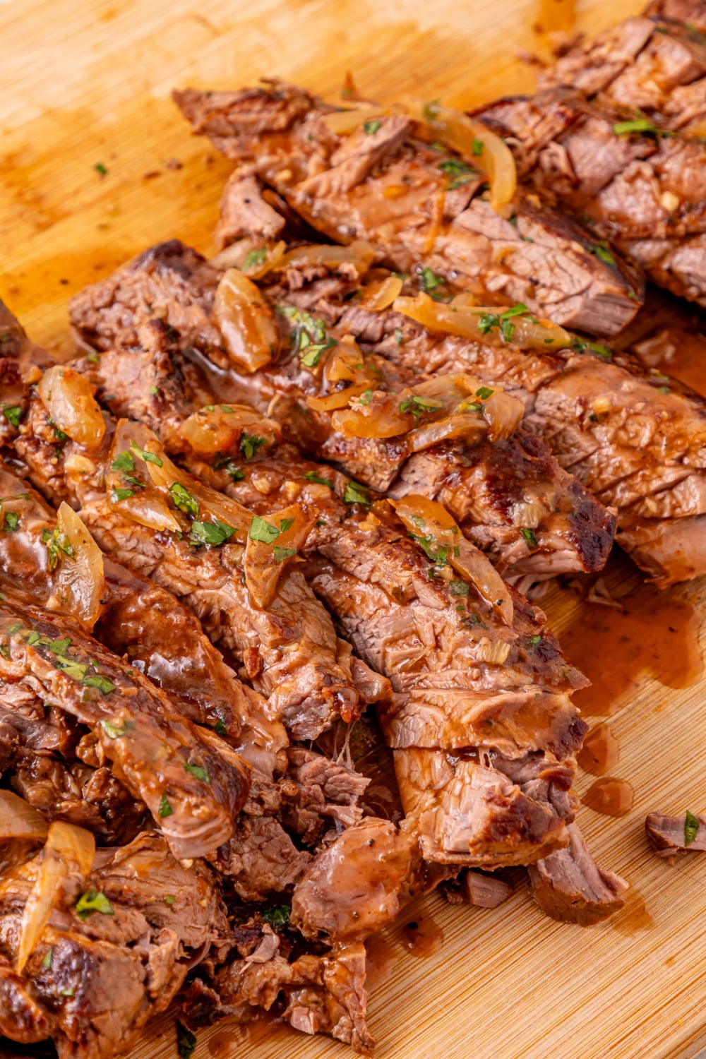 sliced beef on a cutting board