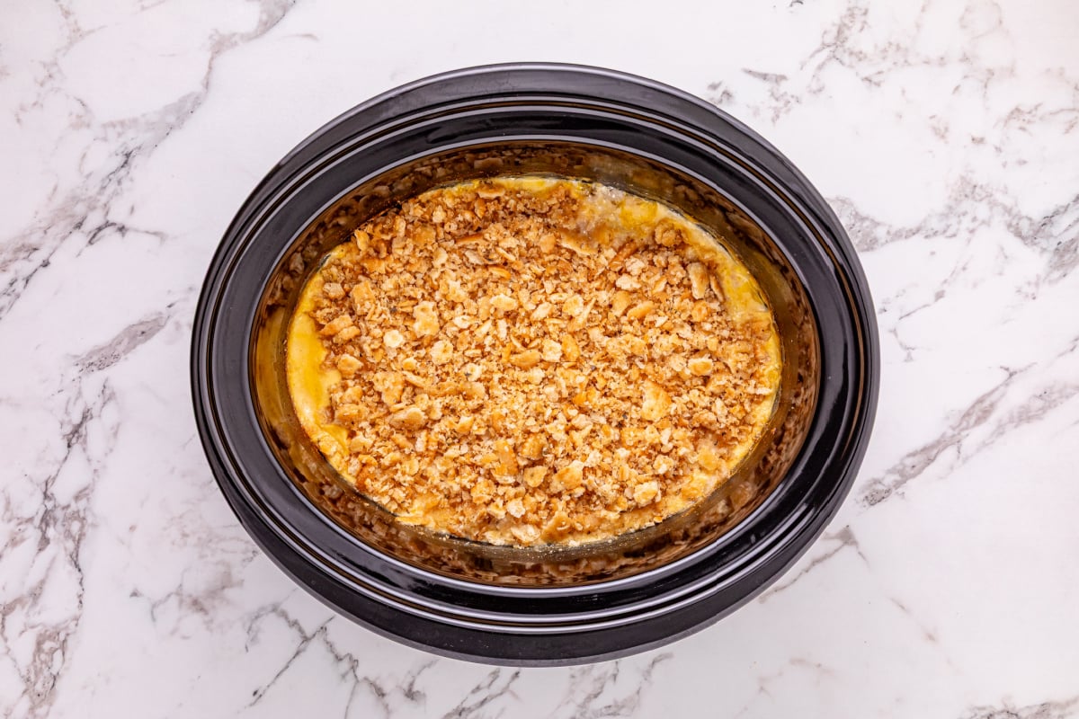 cracker mixture added to slow cooker