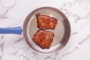 browning steaks in pan