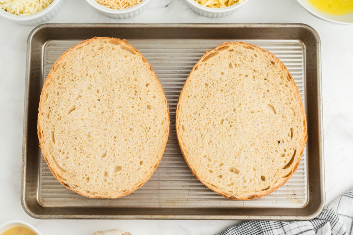 loaf slices on a baking pan