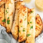 Three Cheese Garlic Bread sliced in a basket