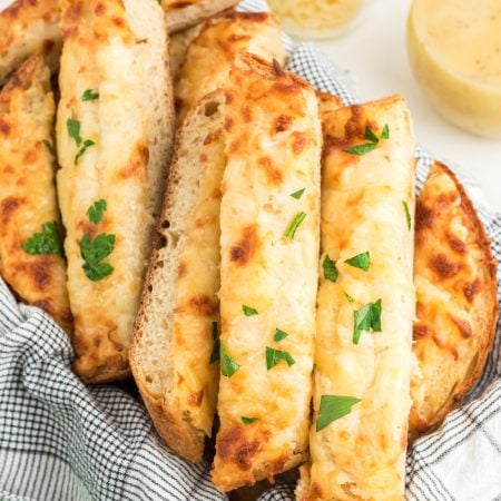 Three Cheese Garlic Bread sliced in a basket