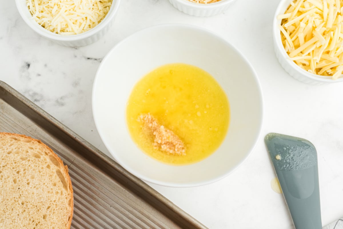 melted butter, minced fresh garlic, and Italian dressing in a bowl