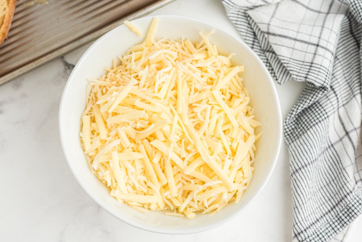 parmesan cheese, gouda, and mozzarella cheese in a bowl