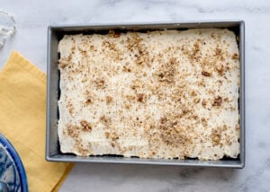 Banana Nut Bars with Cream Cheese Frosting in a pan