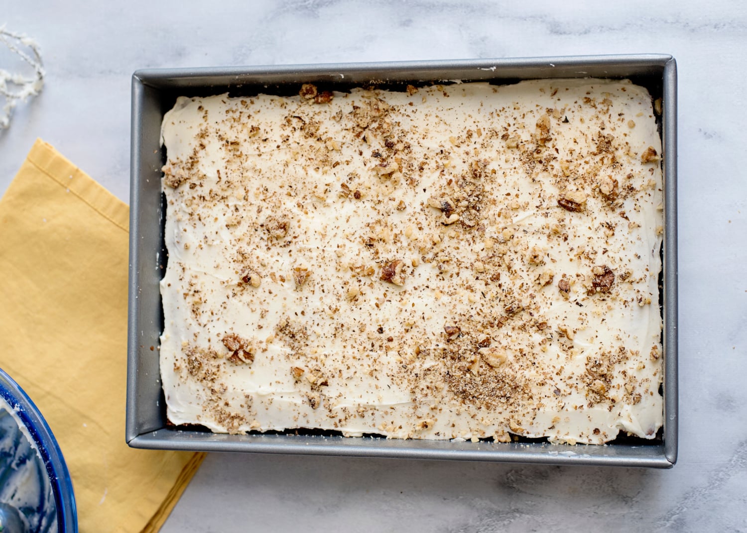 Banana Nut Bars with Cream Cheese Frosting in a pan