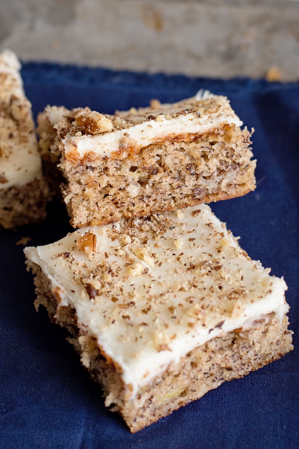 Banana Nut Bars with Cream Cheese Frosting on a plate