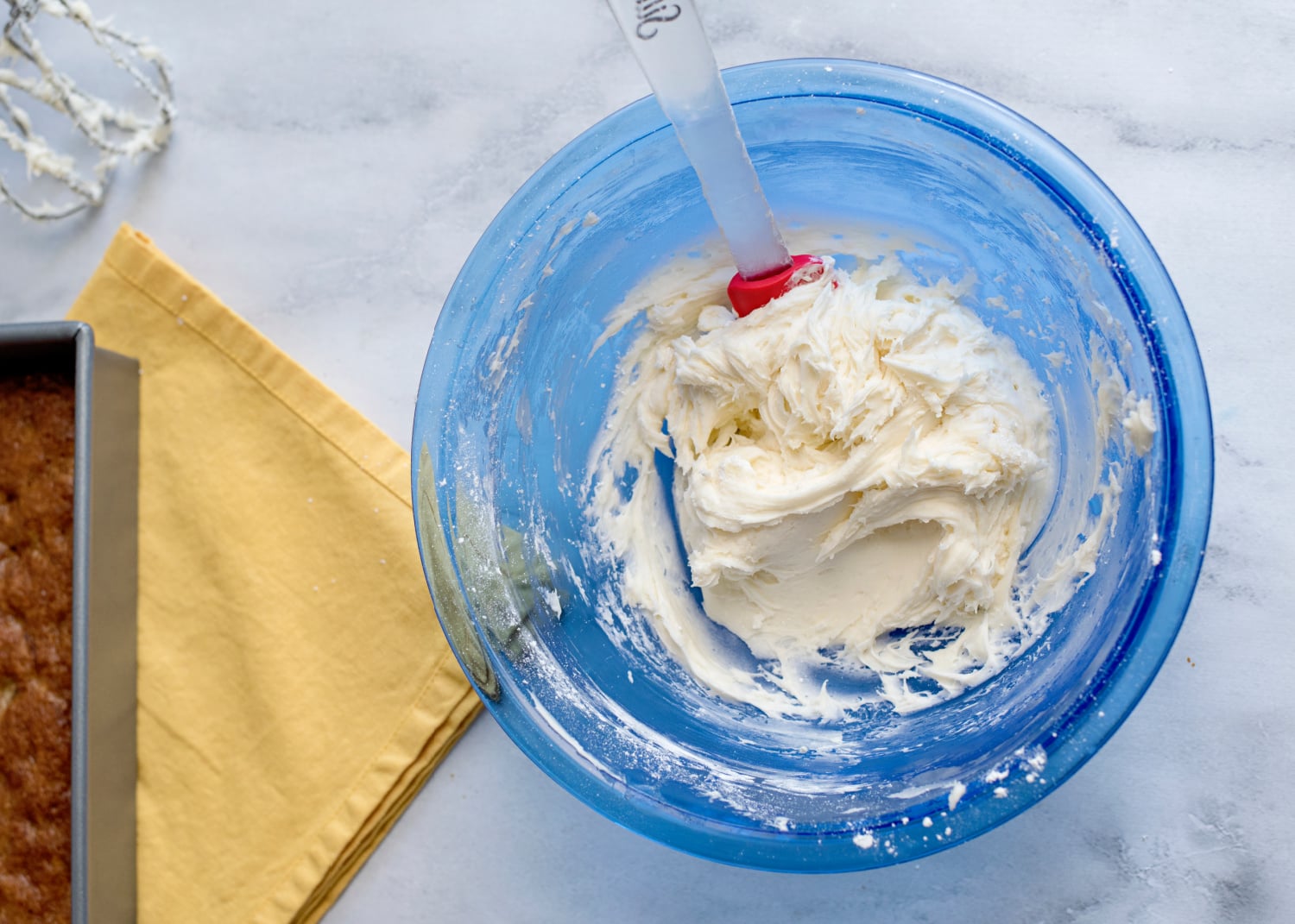 powdered sugar added to frosting mixture