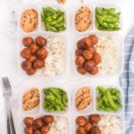 4 lunchboxes with Meatballs and Rice, edamame and cookies