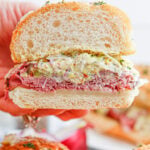 hand holding a Grinder Sub Sandwich