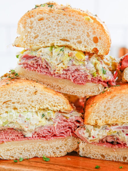 Grinder Sub Sandwiches stacked on a plate