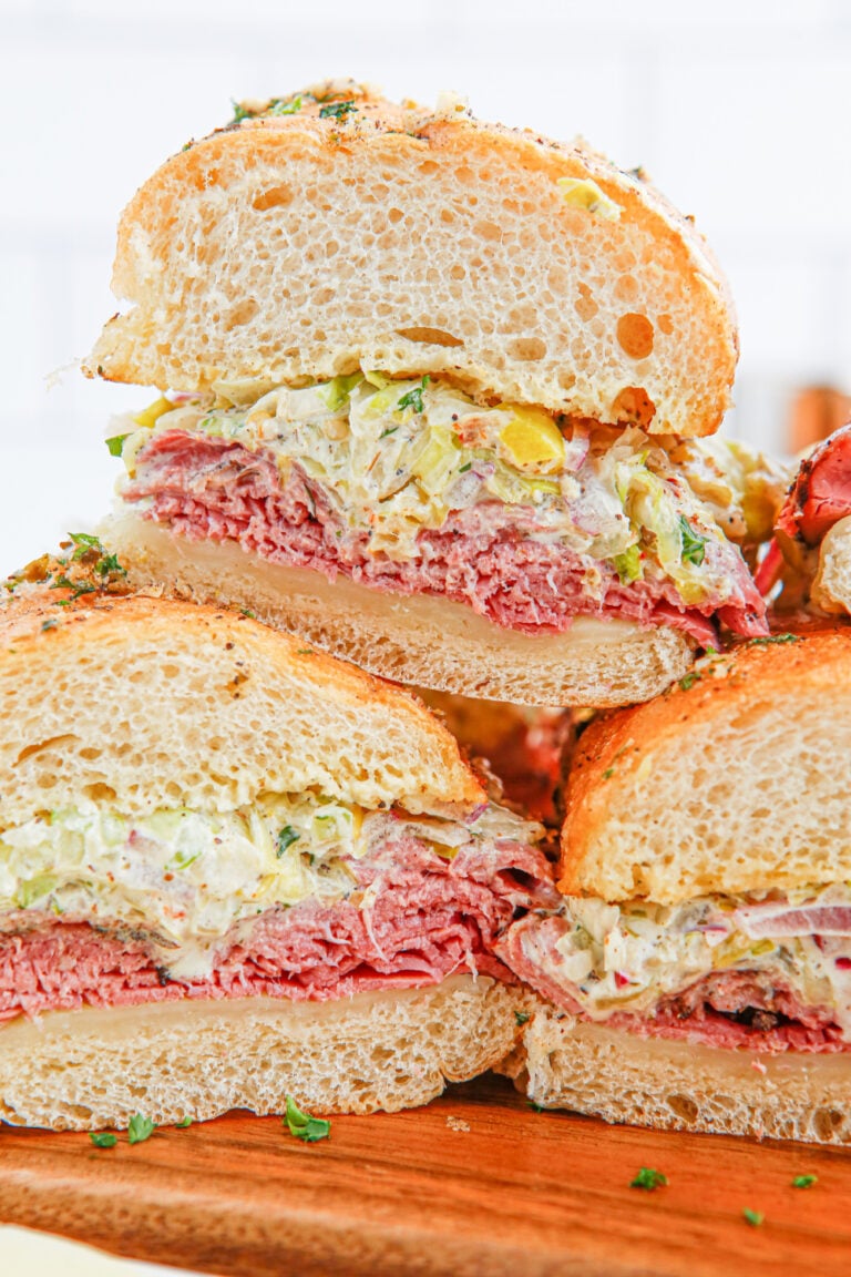 Grinder Sub Sandwiches stacked on a plate