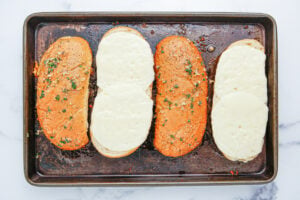 metled cheese on half of buns