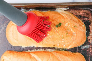 brushing rolls with butter mixture