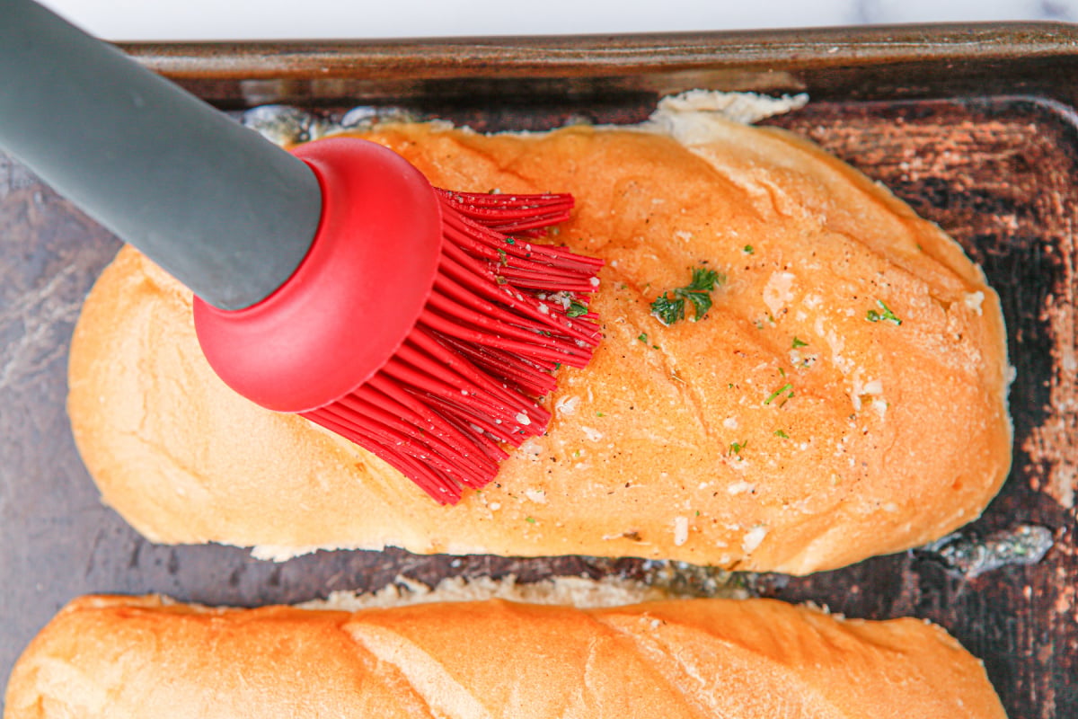 brushing rolls with butter mixture