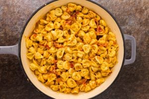 tortellini added to pan