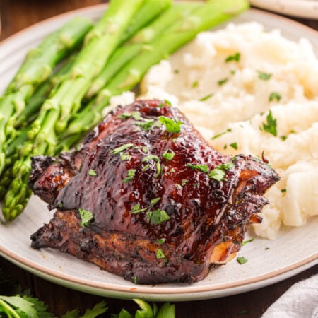 Balsamic Glazed Chicken on a plate with veggies