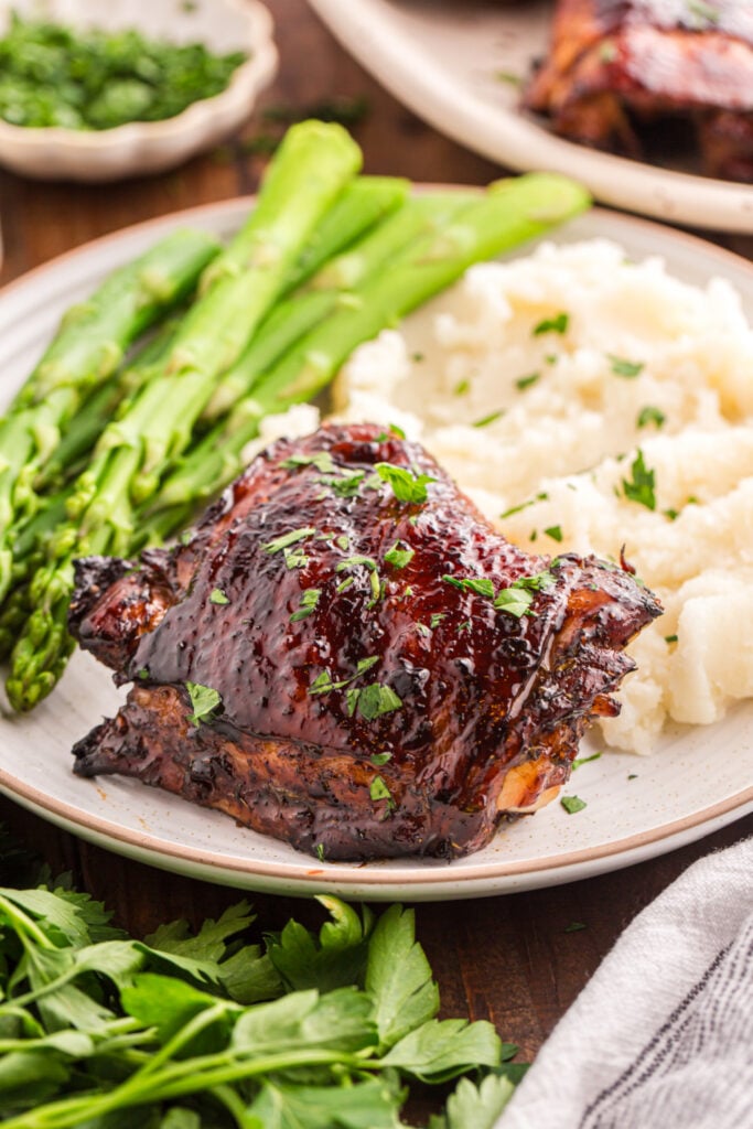 Balsamic Glazed Chicken on a plate with veggies
