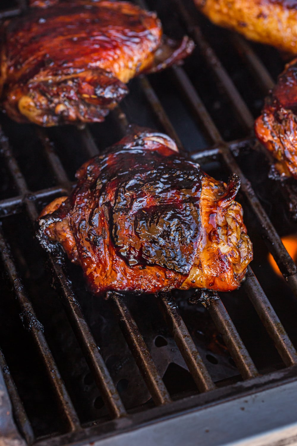 chicken cooking on a grill