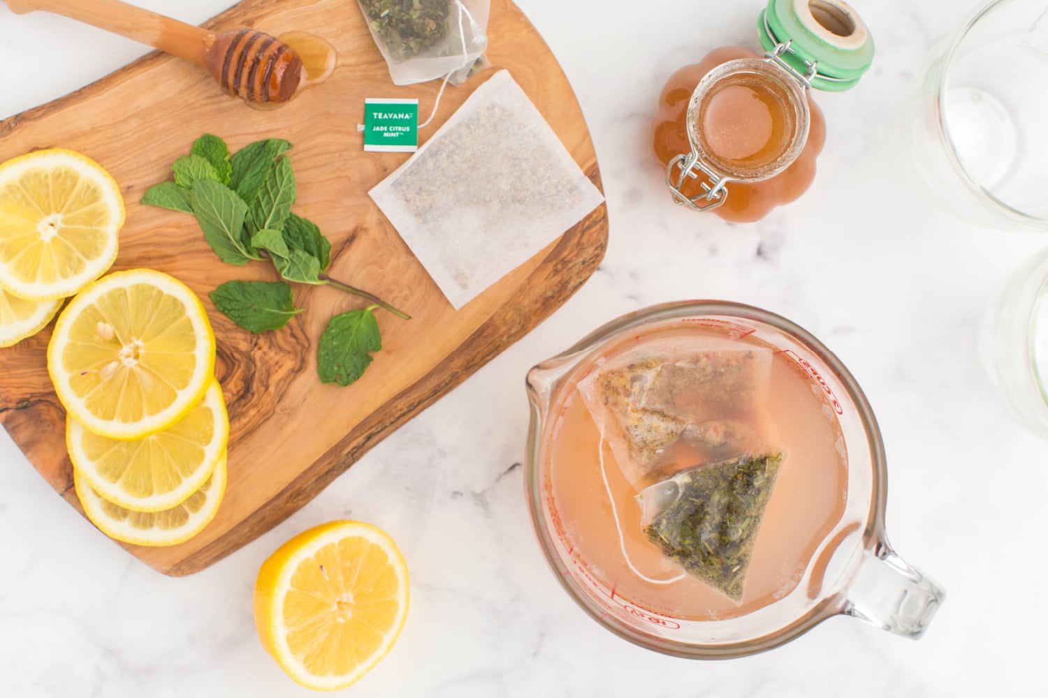 tea bags soaking in lemonade water mixture
